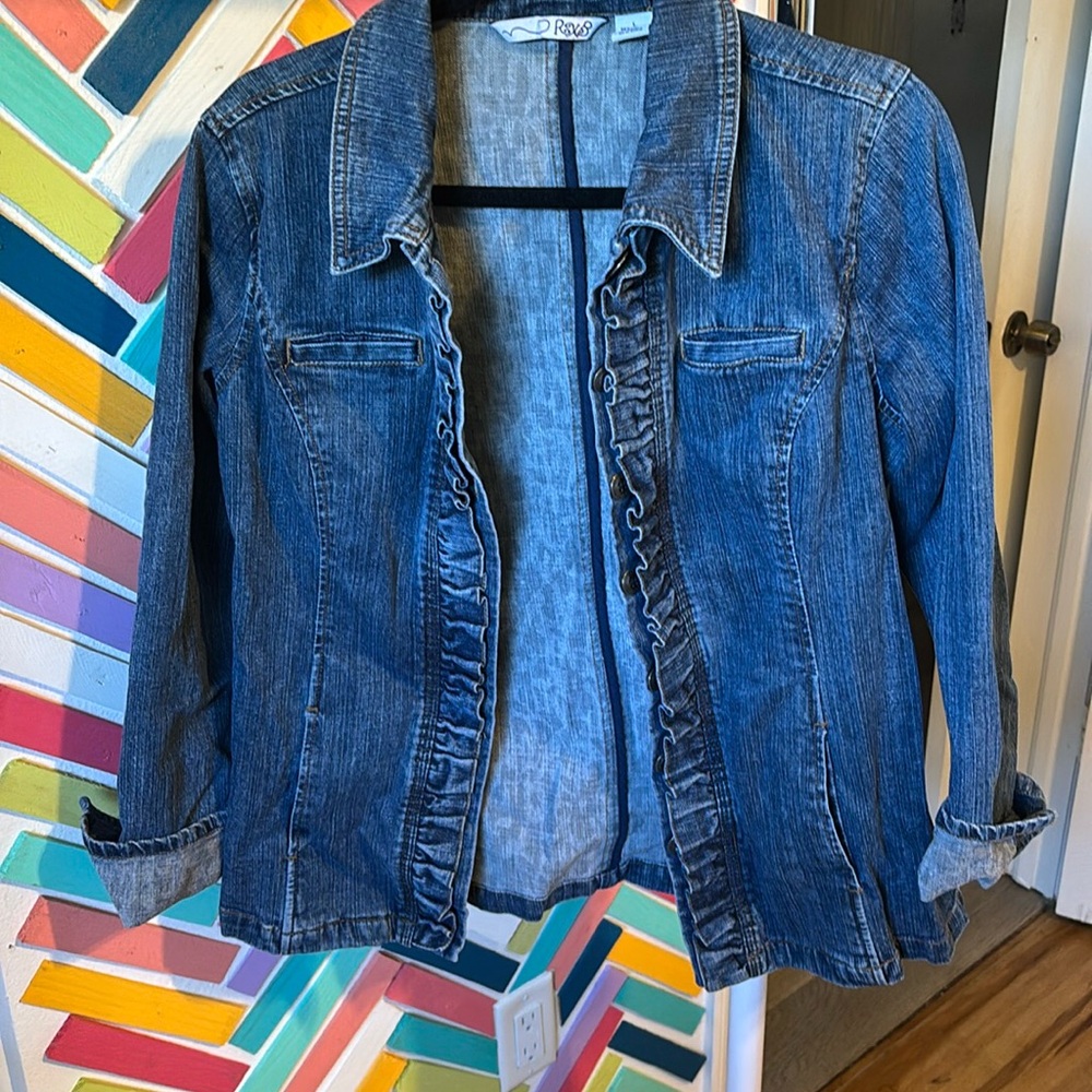 Denim jacket with ruffle detail